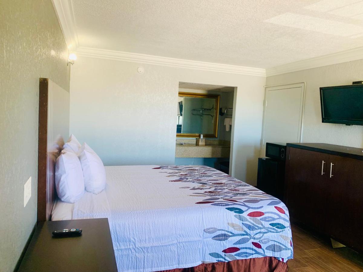 Budget Inn And Suites Crowley Bagian luar foto